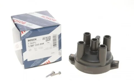 Кришка розподільника запалювання Kia Pride/Mazda 323/626 1.3-2.0 87-06 BOSCH 1 987 233 044