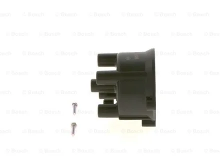 Кришка розподілювача запалювання Nissan Micra 1.0/1.2 82-92 BOSCH 1987233052